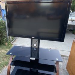 Tv And Stand No Remote But U Can Buy A Fire stick It It Would Come With One 