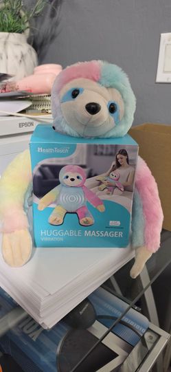 Health Touch Huggable Rainbow Sloth, a plush massager designed for neck and back relaxation