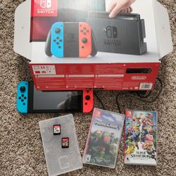 Nintendo switch 32 GB with 4 games and Accessories, Neon Red and Blue
