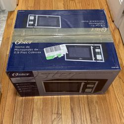 Oster 0.9 Cu Ft. 900watt Microwave (countertop) 