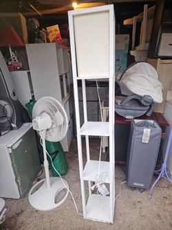 The price is firm..Cute floor shelfing lamp
