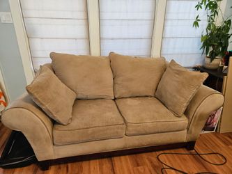 Tan loveseat