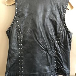 Leather vest & pants for ladies...size 12. Worn once...retail at HD was $250.