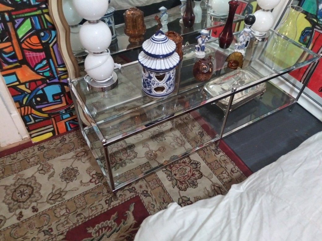 Glass and chrome rectangle shaped coffee table