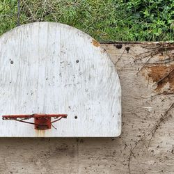 Basketball backboard and hoop with mounting bracket
