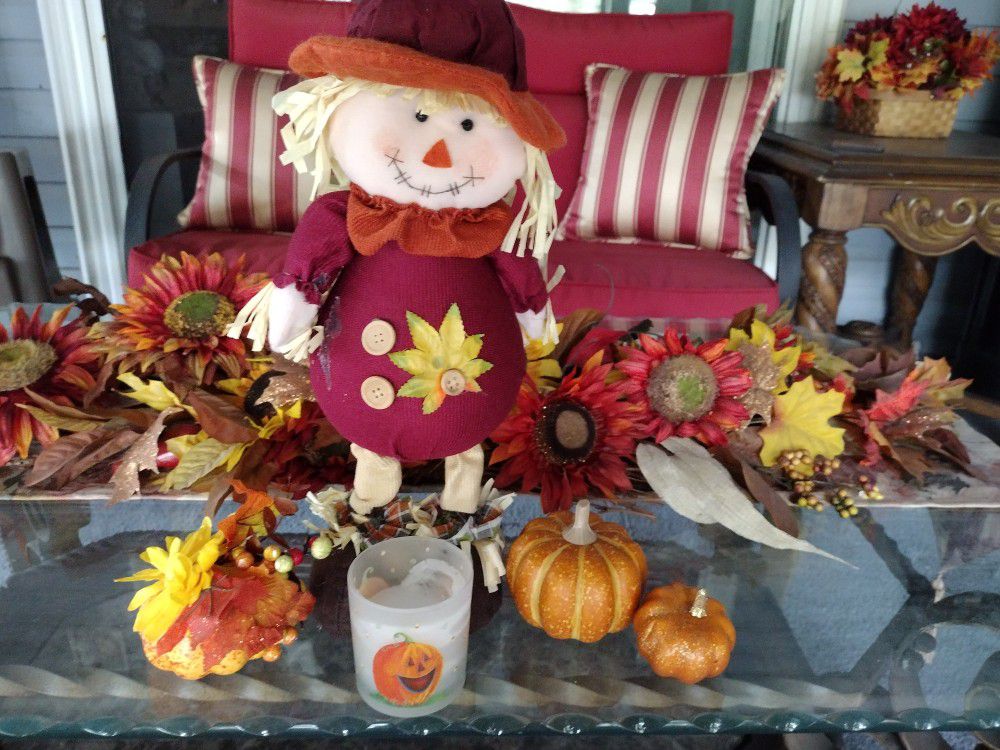 Scarecrow With Candle And Pumpkins