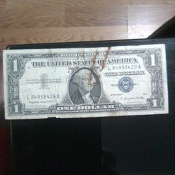 Very Rare Collection Of Coins a One Dollar Bill Silver Certificate, Rare Stamps, And A Vintage Baseball Card 