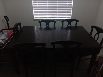 Dining table with extend piece for the middle