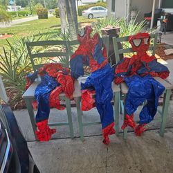 3 inflatable Spiderman figures attaches to windiws
