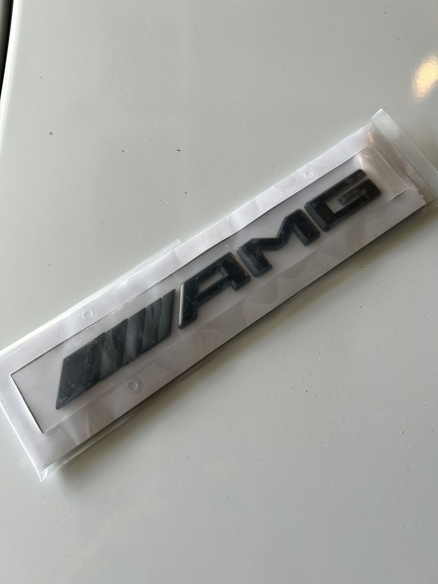 Glossy Black AMG Emblem