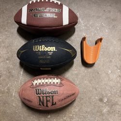 Footballs.   One Junior size