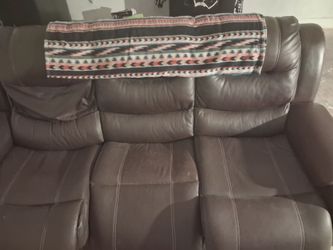 Brown sofa with bed