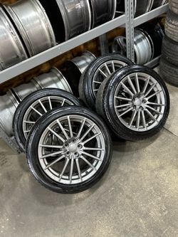 Subaru Impreza WRX 17” wheels Oem rims and tires 5x100