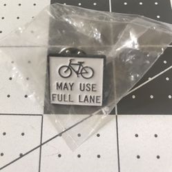 Brand new in sealed bag Bicycle May use full lane Sign lapel pin,