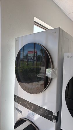 New scratch and dent LG thinQ 27” wash tower. Washer and dryer. 1 year manufacturing warranty