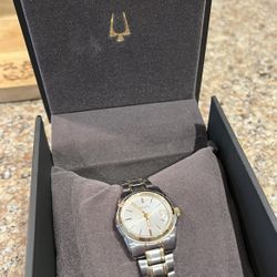 Bulova Ladies' Classic Two-Tone Stainless Steel 3-Hand Calendar Date Quartz Watch, Silver-White Dial (Style: 98M105)