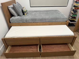 Twin Captain’s Trundle Bed with storage drawers and modern bedding – Excellent Condition!