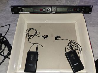 2 Shure slx4 wireless mic recievers w 2 slx1 transmitters and microphones