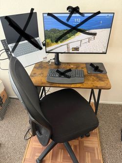 Desk with chair and supports for pc