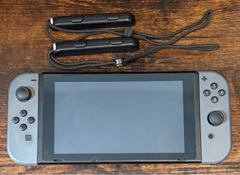 Grey Nintendo Switch + Official Carrying Case