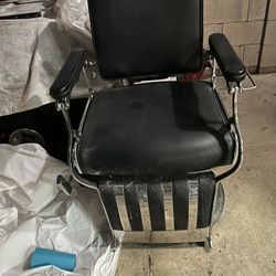 2 Vintage mid-century barber chairs with chrome accent