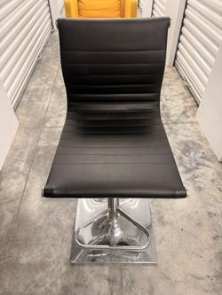 Set of 2 Crosby St. Maxwell Adjustable Faux Leather Barstool, Black. One like New and One Brand New