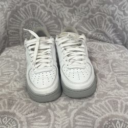 White and grey Nike Air Force 1 trainers