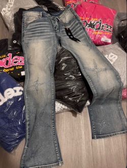 Purple jeans, size 34 let me know