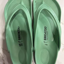 Birkenstock lime green flip flops. size 10. 