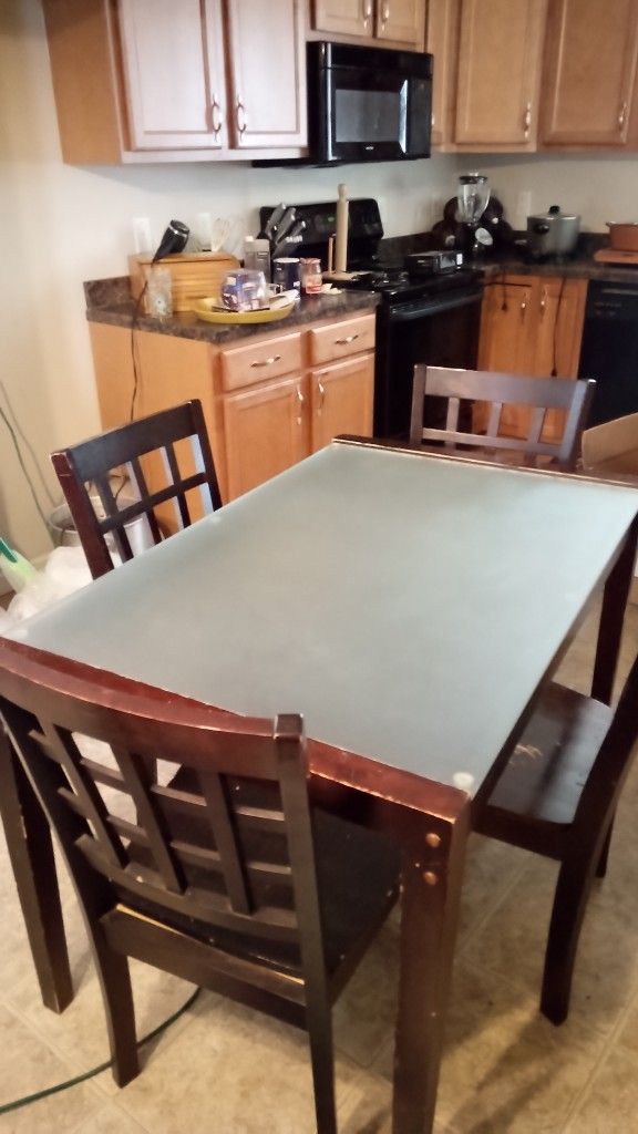 Vintage Glass/Wooden Table With 4 Chairs. MUST GO $50 AND CAN BE DELIVERED!