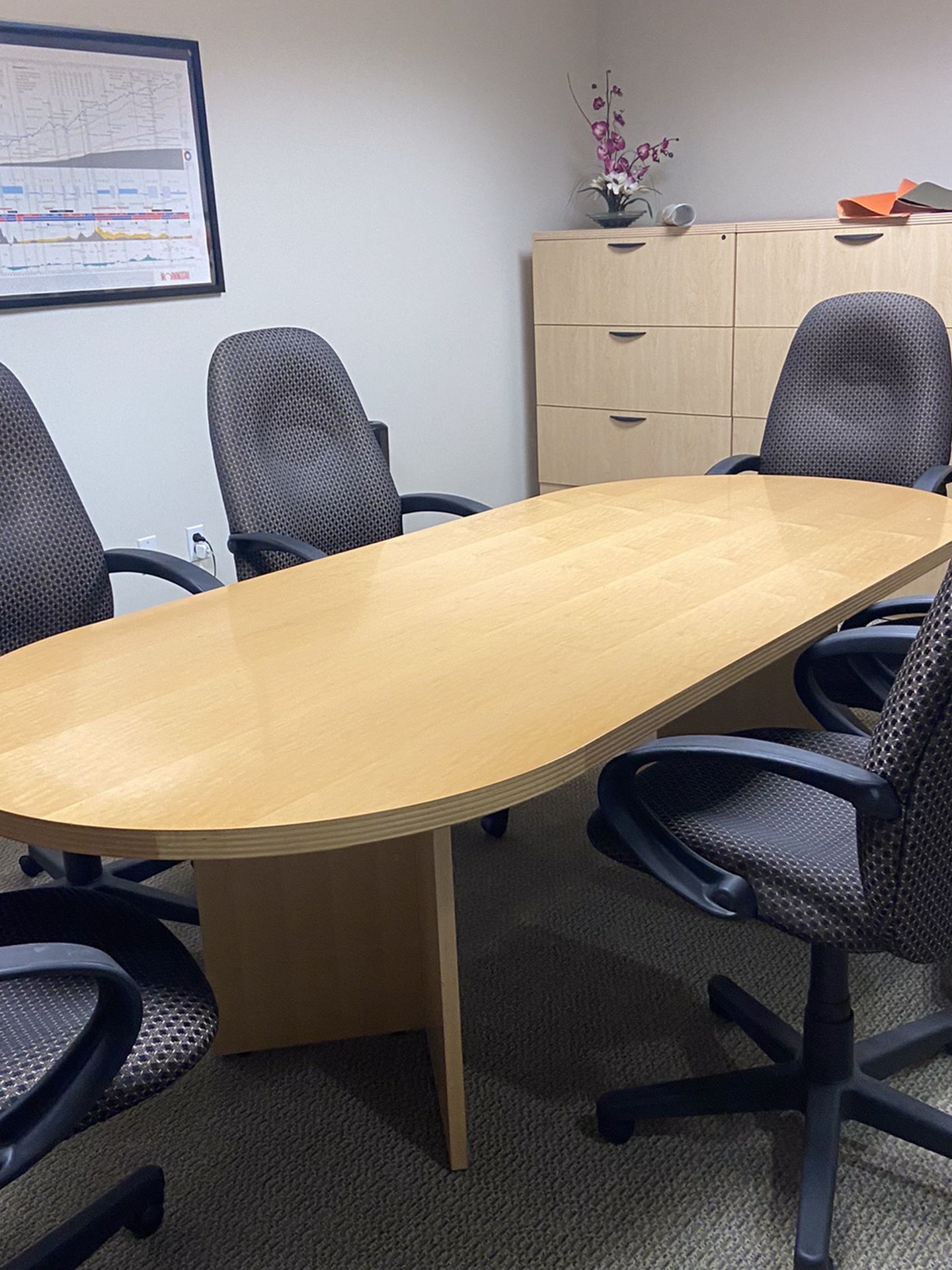 90” X 43” “racetrack” Oval Conference Table. 2 “V” Shaped Legs. Indiana Furniture, Solid Wood,Clear Maple Finish. 8 Adjustable Chairs INCLUDED!