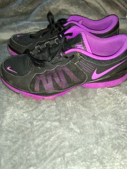 Purple and black nikes