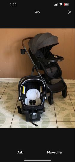 PRACTICALLY NEW GRACO MODES NEST TRAVEL SYSTEM STROLLER CAR SEAT AND BASSINET 3 IN 1