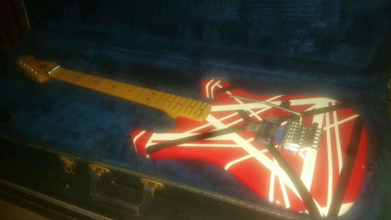 Evh stripped frankinstrat custom with custom pain job wormoth neck and body with Floyd rose and humbucker pickup.