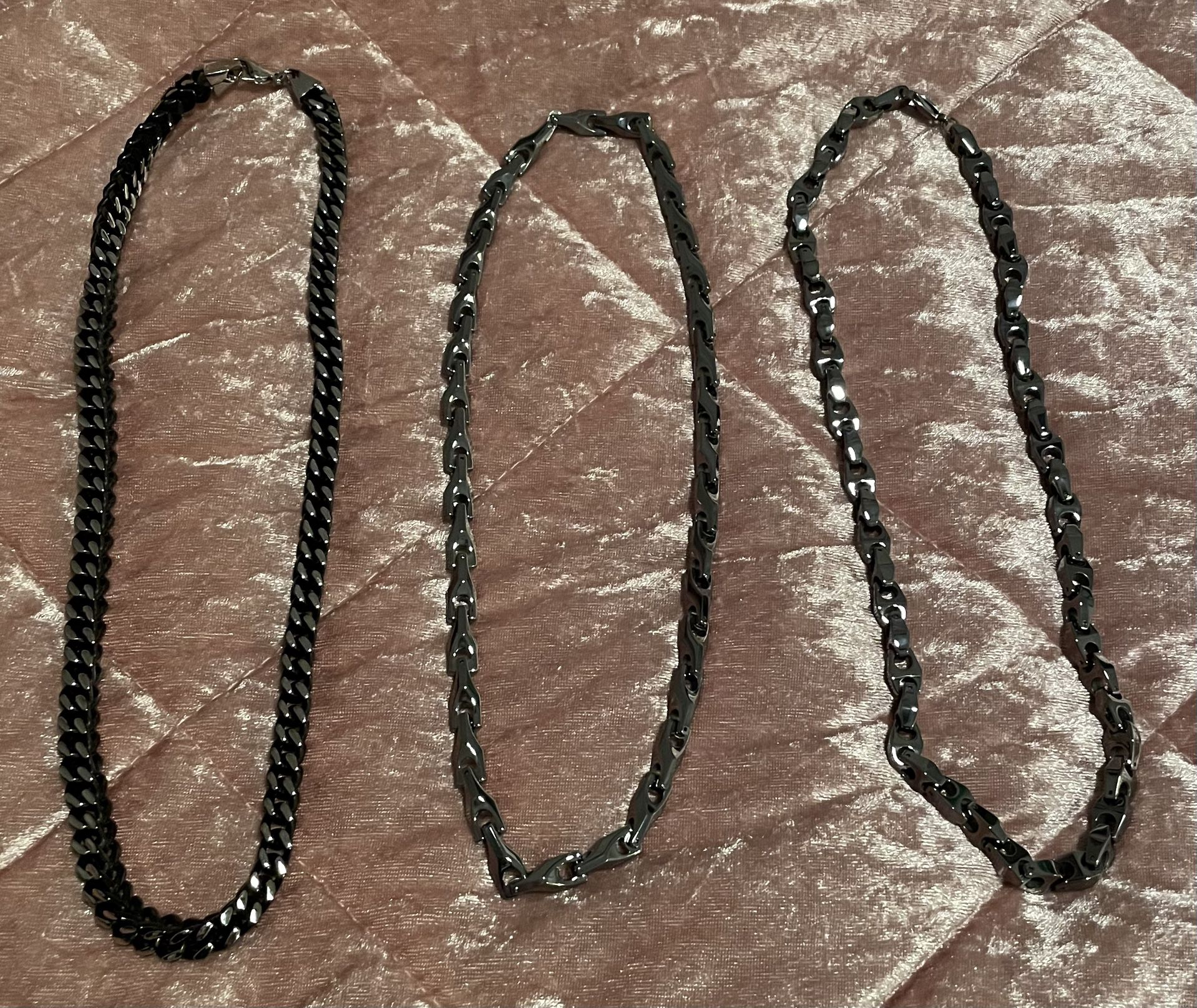 2 Silver 22”Tungsten Chains & 1 Black 24” StainlessSteal Chain (priced separately)