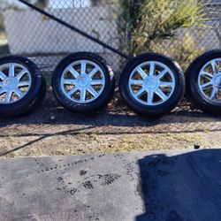 FULL SET OF BRIDGESTONE 275/55/20 WHEELS AND TIRES GREAT CONDITION 