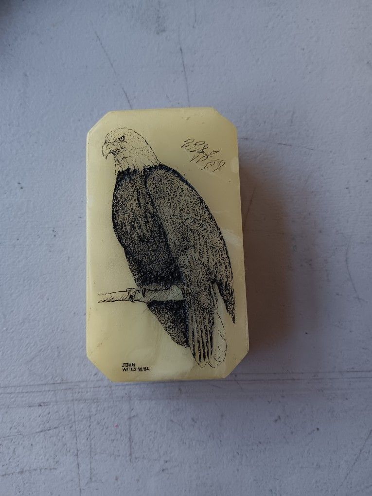 the olivenhain company Etched in marble Eagle.