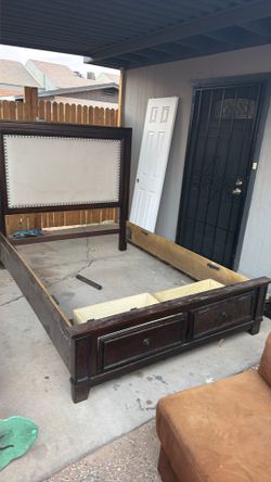 Wooden queen size bed with two large drawers