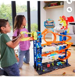 Hot Wheels City Ultimate Garage Playset with 2 Die-Cast Cars, Storage for 50+ Cars Child Age 4-8