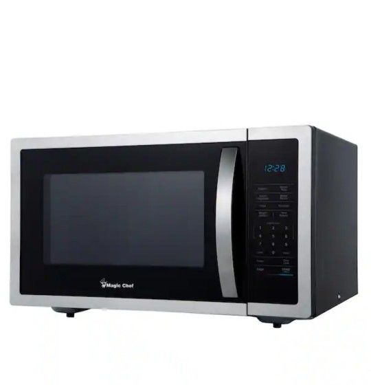 Magic Chef 1.6 Cu, Ft. Countertop Microwave in Stainless Steel with Gray Cavity.