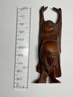 Wood carving Of Buddha