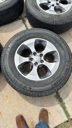 5 Jeep wheels and tires