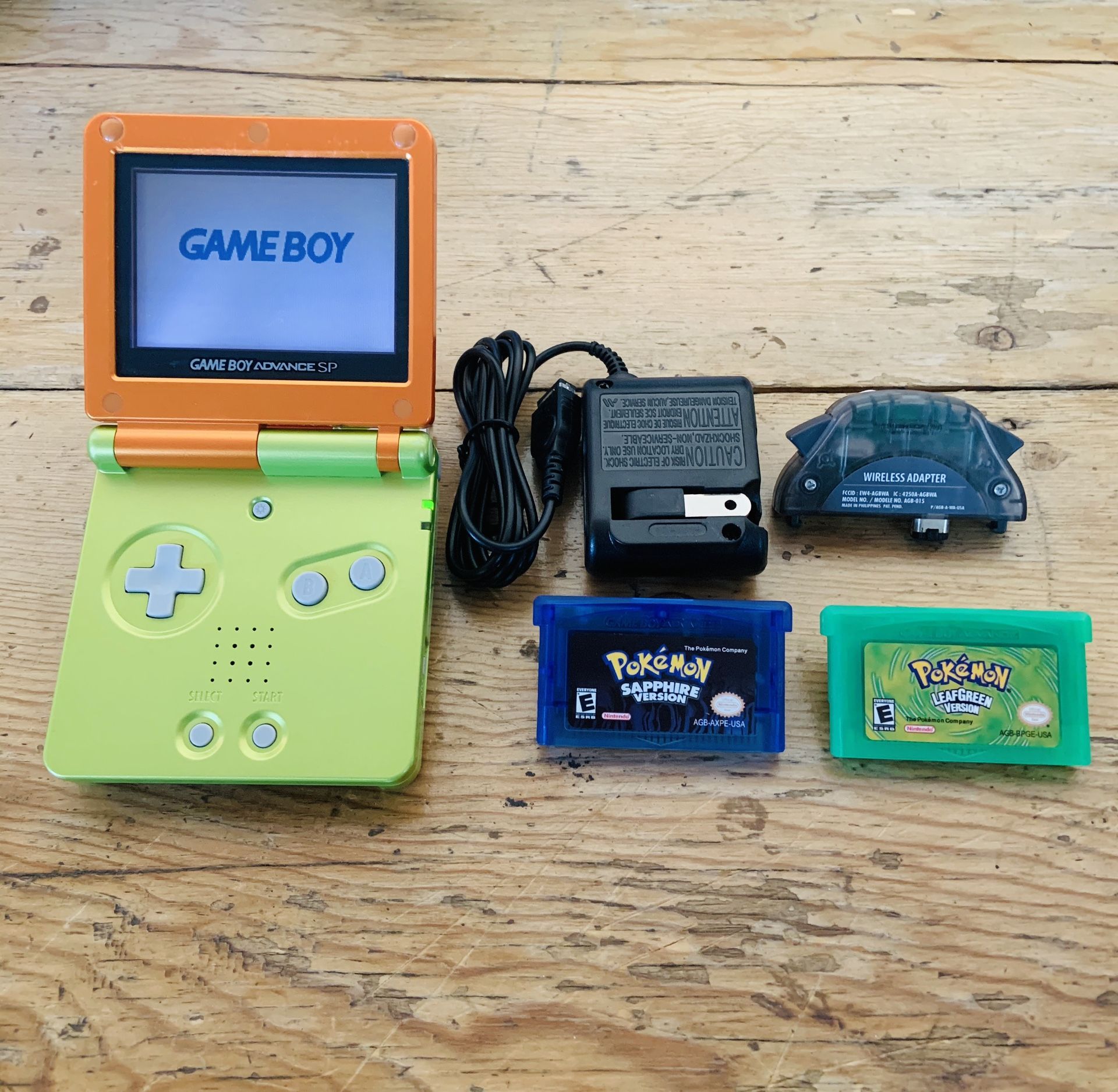 Gameboy Advance SP w/ Pokémon Leaf Green & Sapphire + Wall Charger