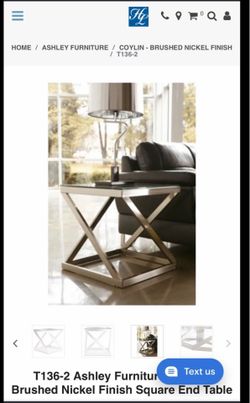 Ashley living room table brand new in box
