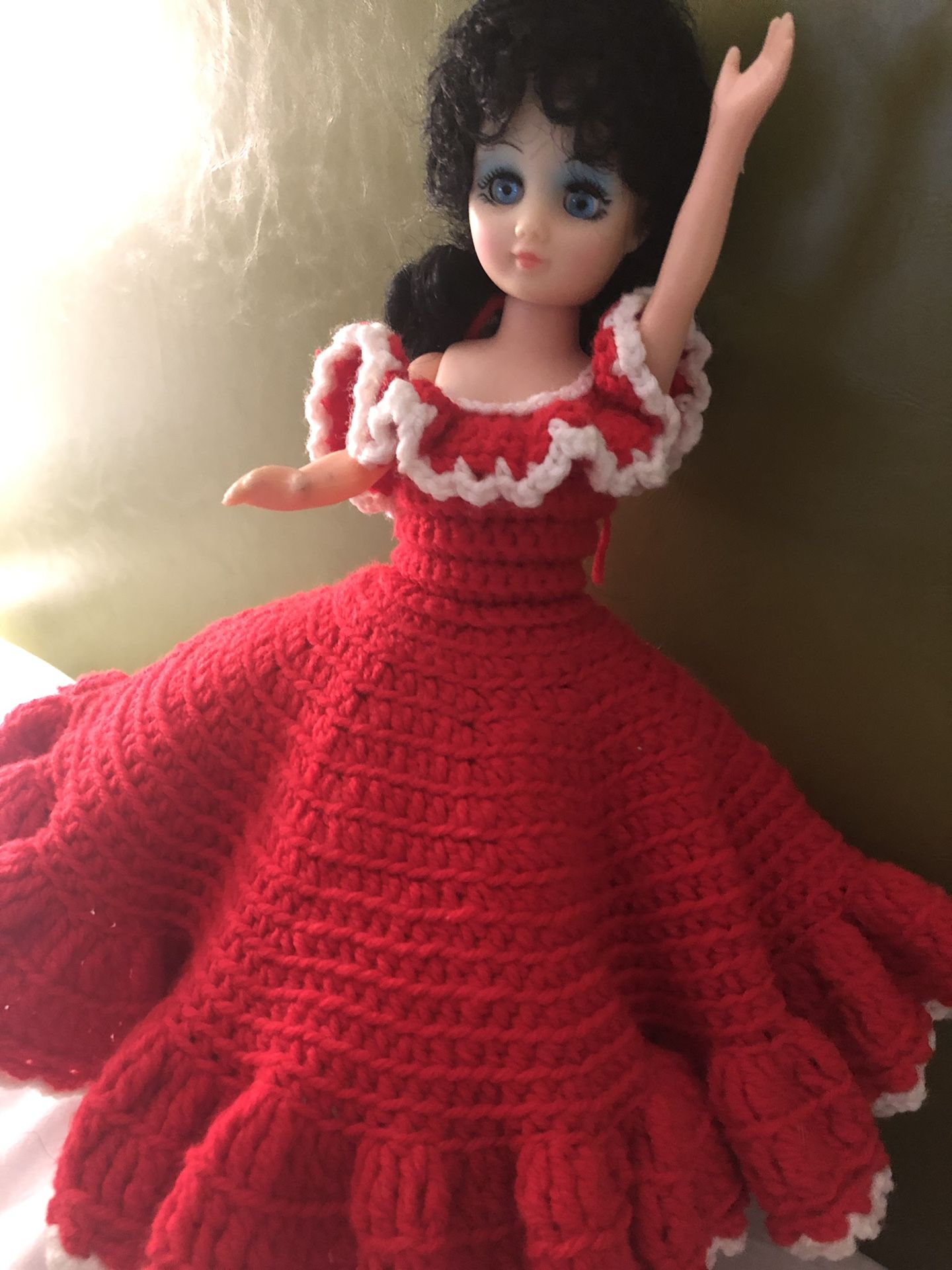 Vintage doll with crochet dress