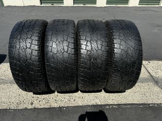 (4) 295/60R20 Pro Comp Sport A/T