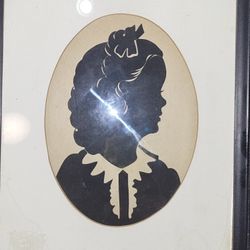 Silhouette Of Young Girl.