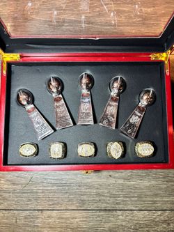 49er champ rings and lombardi trophy in wooden case