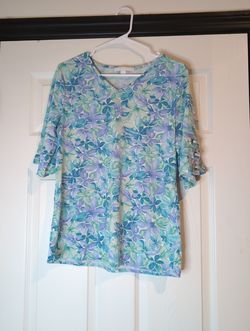 Medium floral lace up sleeve top