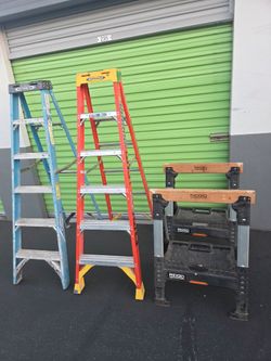 2 werner ladders and 2 folding sawhorse